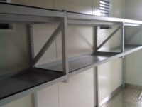 shelves with containment storage containers