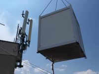 Telecom shelters for mobile network on top of a building