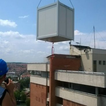 Telecom shelters for mobile network kon top of a building